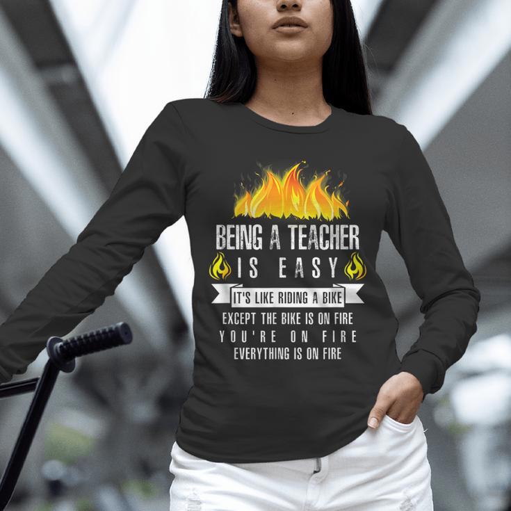 Being a Teacher Is Easy Everything Is On Fire T-Shirt For Men Women Kids Unisex Long Sleeve T-Shirt, novelty gifts, funny gifts