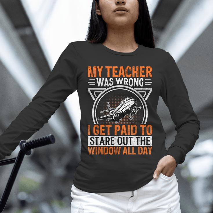 My Teacher Was Wrong I Get Paid To Stare Out The Window Unisex Long Sleeve T-Shirt, novelty gifts, funny gifts My Teacher Was Wrong I Get Paid To Stare Out The Window Unisex Long Sleeve T-Shirt, novelty gifts, funny gifts