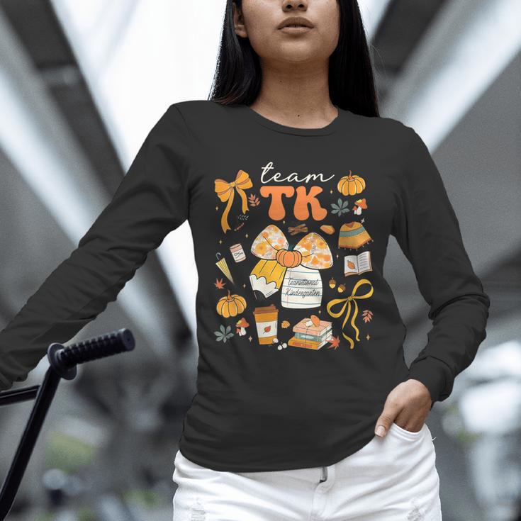 Team TK Crew Preppy Coquette Bow Pumpkin Fall TK Teacher Unisex Long Sleeve T-Shirt, novelty gifts, funny gifts Team TK Crew Preppy Coquette Bow Pumpkin Fall TK Teacher Unisex Long Sleeve T-Shirt, novelty gifts, funny gifts