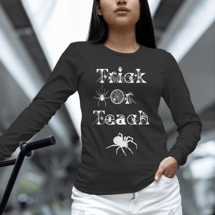 Trick Or Teach Halloween Teacher Shirt Teaching Spider Tee For Men Women Kids Unisex Long Sleeve T-Shirt, novelty gifts, funny gifts Trick Or Teach Halloween Teacher Shirt Teaching Spider Tee For Men Women Kids Unisex Long Sleeve T-Shirt, novelty gifts, funny gifts
