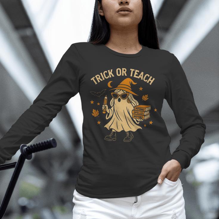 Trick Or Teach Halloween Teacher Unisex Long Sleeve T-Shirt, novelty gifts, funny gifts Trick Or Teach Halloween Teacher Unisex Long Sleeve T-Shirt, novelty gifts, funny gifts