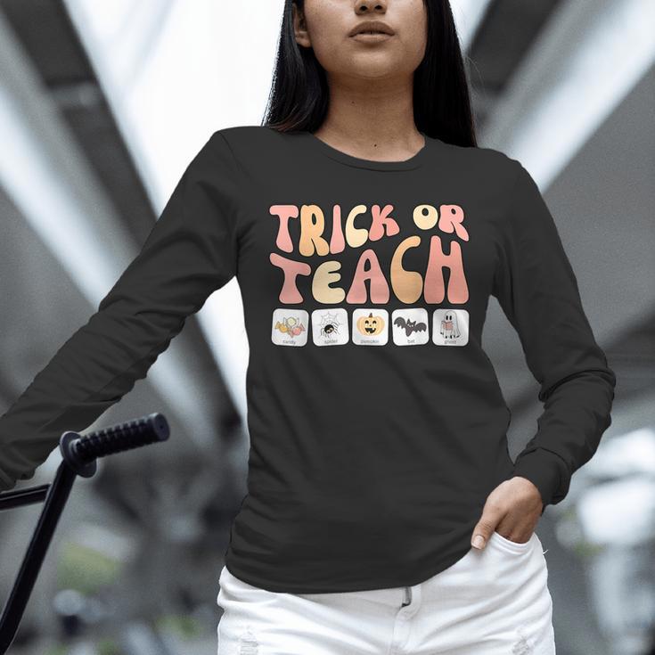 Trick Or Teach With Symbols Special Education Teacher Spooky Unisex Long Sleeve T-Shirt, novelty gifts, funny gifts
