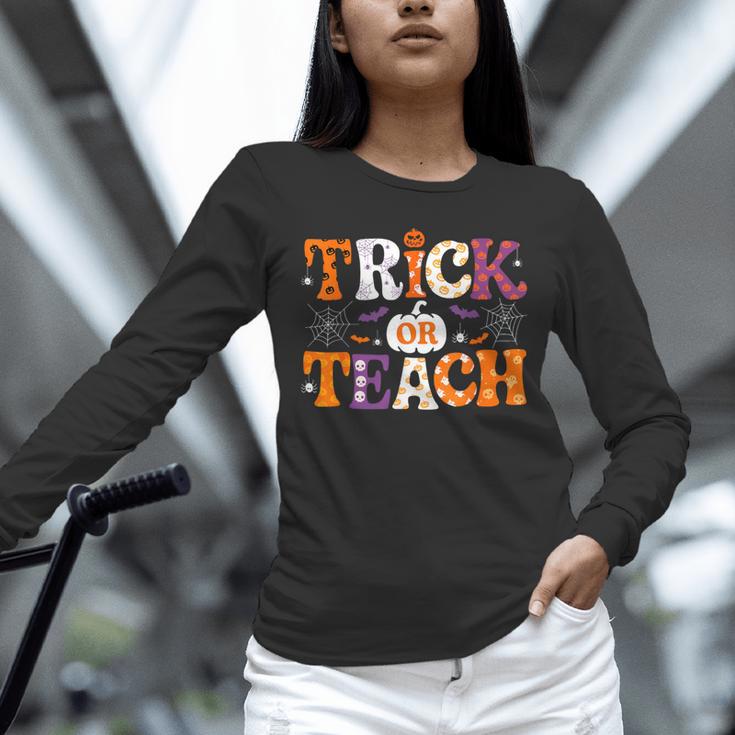 Trick Or Teach Teacher Halloween Costume Men Women Unisex Long Sleeve T-Shirt, novelty gifts, funny gifts Trick Or Teach Teacher Halloween Costume Men Women Unisex Long Sleeve T-Shirt, novelty gifts, funny gifts