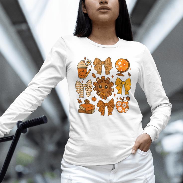 Coquette Teach Teacher Bows Thanksgiving Turkey Fall Autumn Unisex Long Sleeve T-Shirt, novelty gifts, funny gifts Coquette Teach Teacher Bows Thanksgiving Turkey Fall Autumn Unisex Long Sleeve T-Shirt, novelty gifts, funny gifts