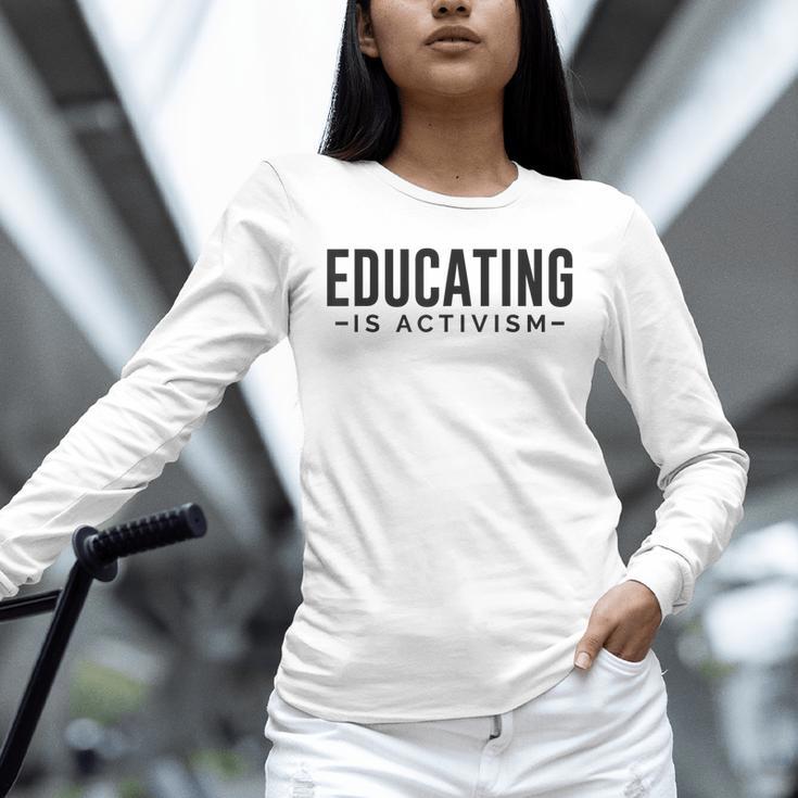 Educating Is Activism Feminist Social Justice Teacher For Men Women Unisex Long Sleeve T-Shirt, novelty gifts, funny gifts Educating Is Activism Feminist Social Justice Teacher For Men Women Unisex Long Sleeve T-Shirt, novelty gifts, funny gifts