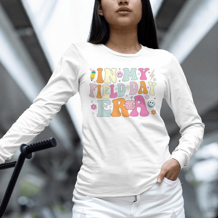 In My Field Day Era Teacher Kids Cute Groovy Field Day Unisex Long Sleeve T-Shirt, novelty gifts, funny gifts In My Field Day Era Teacher Kids Cute Groovy Field Day Unisex Long Sleeve T-Shirt, novelty gifts, funny gifts