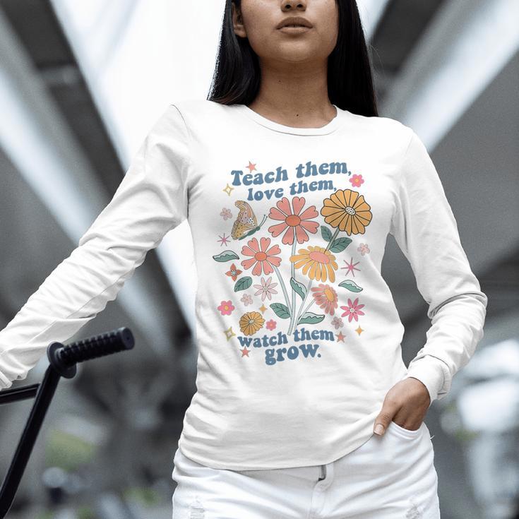 Teach Them Love Them Watch Them Grow Retro Teacher Floral Unisex Long Sleeve T-Shirt, novelty gifts, funny gifts Teach Them Love Them Watch Them Grow Retro Teacher Floral Unisex Long Sleeve T-Shirt, novelty gifts, funny gifts
