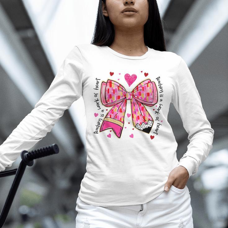 Teaching Is A Work Of Heart Pencil Bow Teacher Valentine Unisex Long Sleeve T-Shirt, novelty gifts, funny gifts Teaching Is A Work Of Heart Pencil Bow Teacher Valentine Unisex Long Sleeve T-Shirt, novelty gifts, funny gifts
