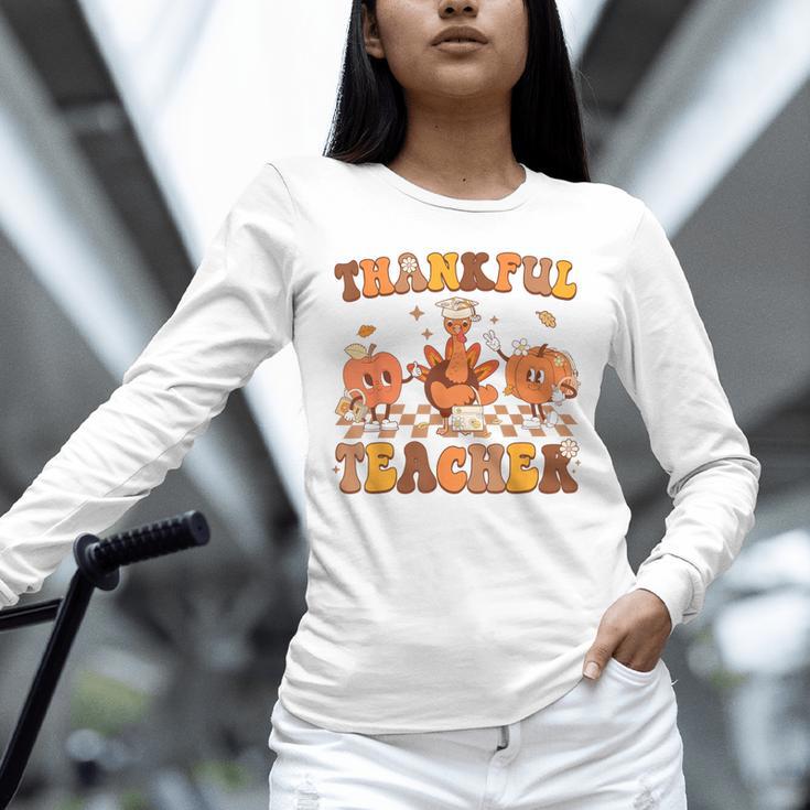 Thankful Teacher Retro Groovy Thanksgiving Fall Women Men Unisex Long Sleeve T-Shirt, novelty gifts, funny gifts Thankful Teacher Retro Groovy Thanksgiving Fall Women Men Unisex Long Sleeve T-Shirt, novelty gifts, funny gifts