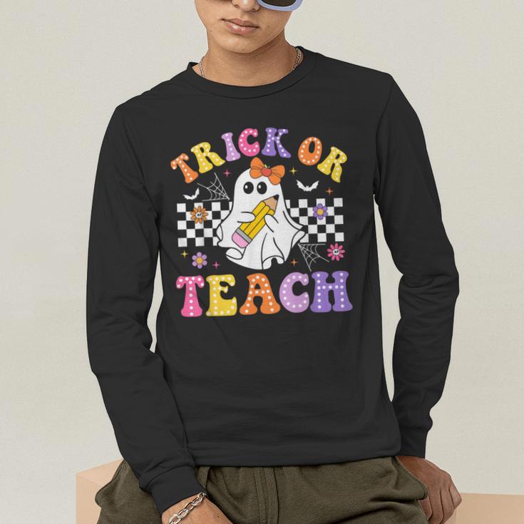 Trick Or Teach Groovy Halloween Teachers Men's Long Sleeve T-Shirt, funny gift Trick Or Teach Groovy Halloween Teachers Men's Long Sleeve T-Shirt, funny gift