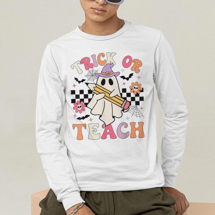 Trick Or Teach Groovy Teacher Halloween Retro Floral Ghost Men's Long Sleeve T-Shirt, funny gift