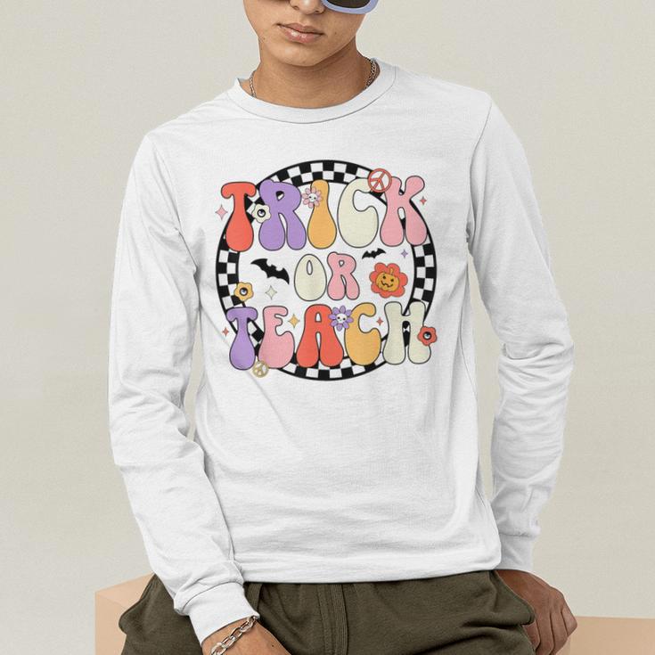 Trick Or Teach Retro Groovy Halloween Teacher Men's Long Sleeve T-Shirt, funny gift Trick Or Teach Retro Groovy Halloween Teacher Men's Long Sleeve T-Shirt, funny gift