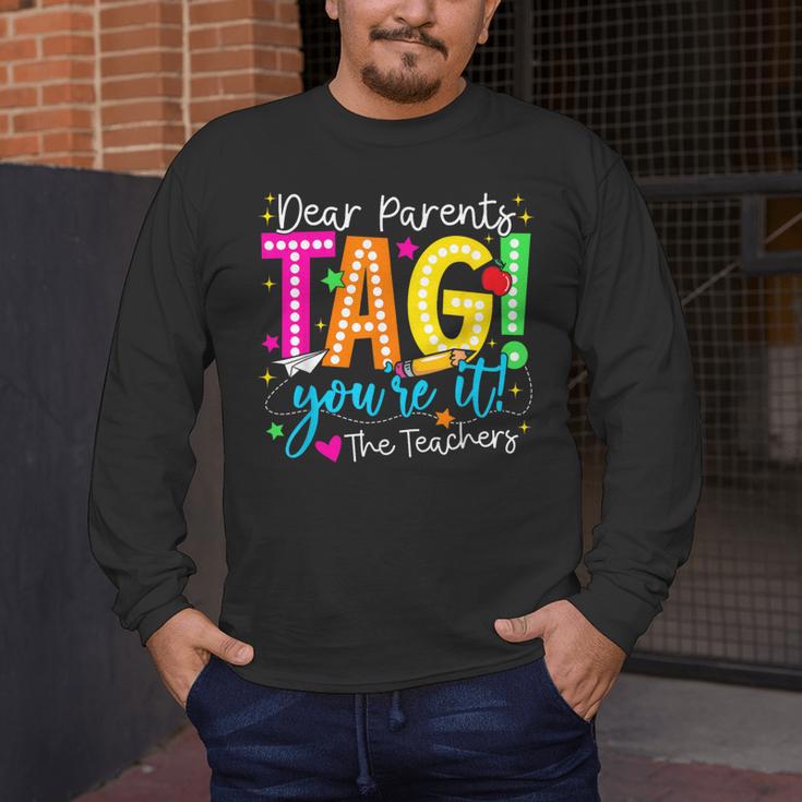 Dear Parents Tag You'Re It Love Teachers Last Day Of School Men's Long Sleeve T-Shirt, funny design Dear Parents Tag You'Re It Love Teachers Last Day Of School Men's Long Sleeve T-Shirt, funny design
