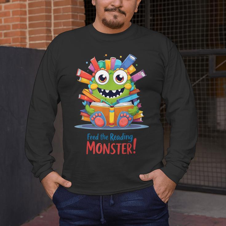 Feed The Reading Monster Halloween Teacher Men's Long Sleeve T-Shirt, funny design Feed The Reading Monster Halloween Teacher Men's Long Sleeve T-Shirt, funny design