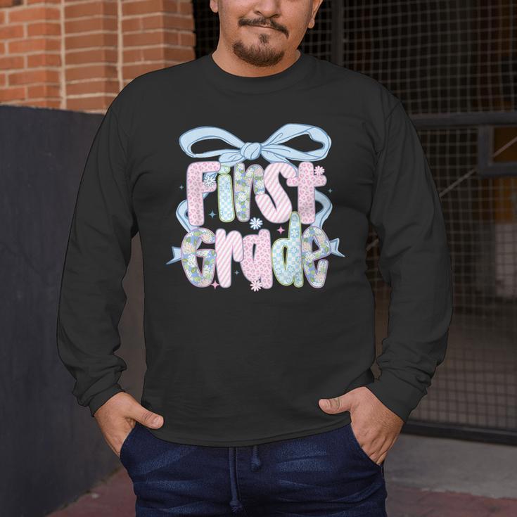 First Grade Coquette Bow Girls Teacher Team 1st Grade Squad Men's Long Sleeve T-Shirt, funny design First Grade Coquette Bow Girls Teacher Team 1st Grade Squad Men's Long Sleeve T-Shirt, funny design