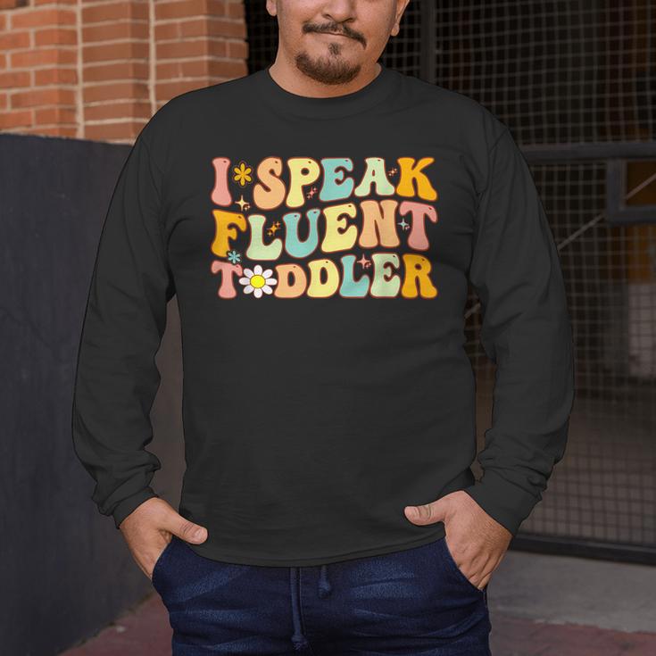 Groovy I Speak Fluent Toddler Daycare Provider Teacher Men's Long Sleeve T-Shirt, funny design Groovy I Speak Fluent Toddler Daycare Provider Teacher Men's Long Sleeve T-Shirt, funny design