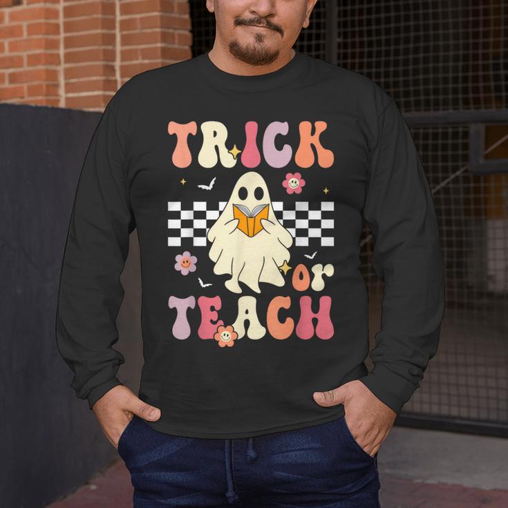 Groovy Teacher Halloween Retro Trick Or Teach Floral Ghost Men's Long Sleeve T-Shirt, funny design