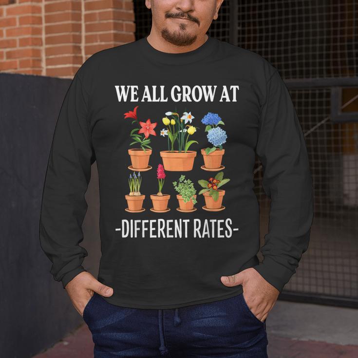 We All Grow At Different Rates Back To School Teacher Men's Long Sleeve T-Shirt, funny design We All Grow At Different Rates Back To School Teacher Men's Long Sleeve T-Shirt, funny design