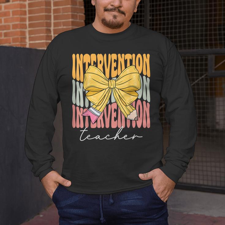 Interventionist Teacher Groovy Coquette Bow Back To School Men's Long Sleeve T-Shirt, funny design Interventionist Teacher Groovy Coquette Bow Back To School Men's Long Sleeve T-Shirt, funny design