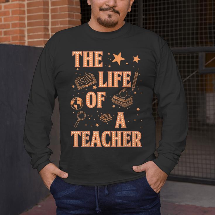 The Life Of A Teacher Back To School Women Men Men's Long Sleeve T-Shirt, funny design The Life Of A Teacher Back To School Women Men Men's Long Sleeve T-Shirt, funny design