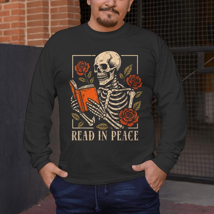 Read In Peace Skeleton Reading Book Halloween Teacher Men's Long Sleeve T-Shirt, funny design Read In Peace Skeleton Reading Book Halloween Teacher Men's Long Sleeve T-Shirt, funny design