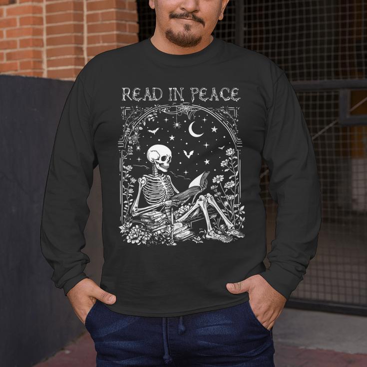 Read In Peace Skeleton Reading Teacher Spooky Halloween Men's Long Sleeve T-Shirt, funny design Read In Peace Skeleton Reading Teacher Spooky Halloween Men's Long Sleeve T-Shirt, funny design