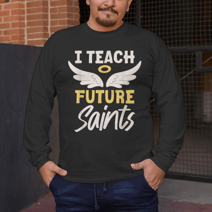 I Teach Future Saints Catholic Educator Teacher Men's Long Sleeve T-Shirt, funny design