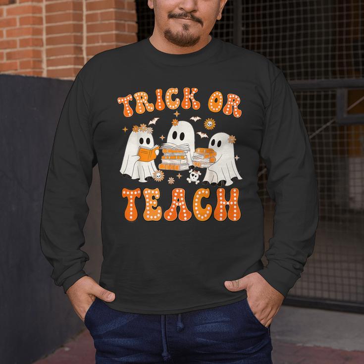 Teacher Halloween Trick Or Teach Retro Groovy Floral Ghost Men's Long Sleeve T-Shirt, funny design Teacher Halloween Trick Or Teach Retro Groovy Floral Ghost Men's Long Sleeve T-Shirt, funny design