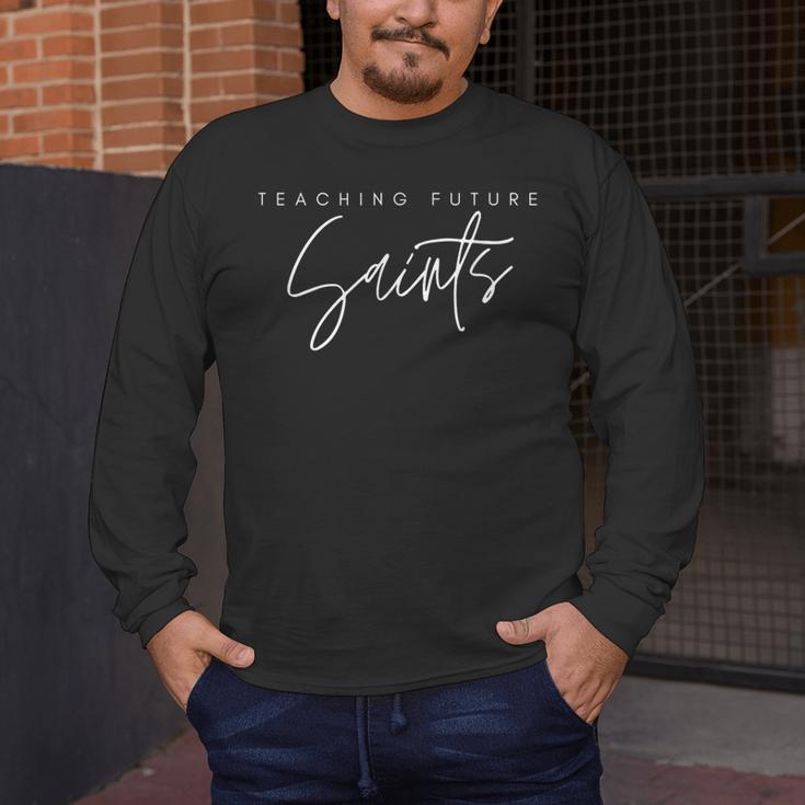Teaching Future Saints Catholic Teacher Men's Long Sleeve T-Shirt, funny design
