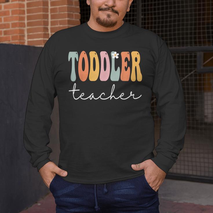Toddler Teacher Retro Groovy Women Happy First Day Of School Men's Long Sleeve T-Shirt, funny design
