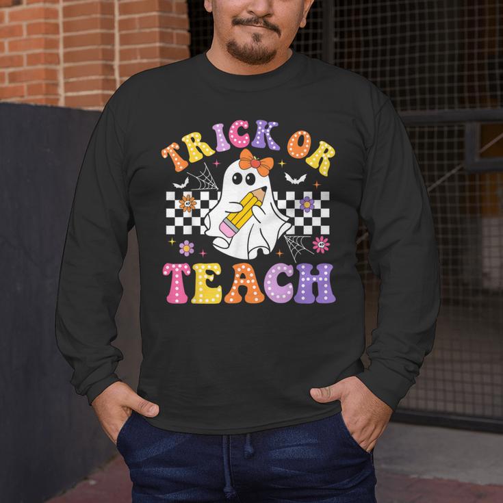 Trick Or Teach Groovy Halloween Teachers Men's Long Sleeve T-Shirt, funny design Trick Or Teach Groovy Halloween Teachers Men's Long Sleeve T-Shirt, funny design