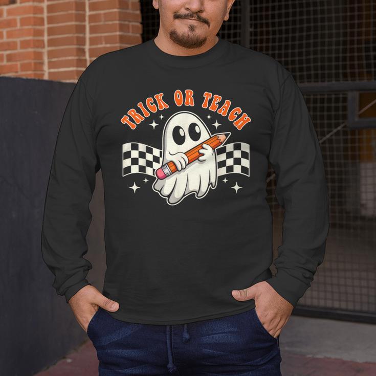 Trick Or Teach Groovy Retro Ghost Halloween Teacher Kids Men's Long Sleeve T-Shirt, funny design
