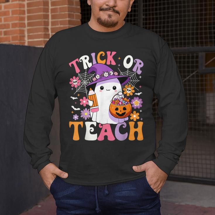 Trick Or Teach Groovy Teacher Ghost Halloween Teacher Men's Long Sleeve T-Shirt, funny design Trick Or Teach Groovy Teacher Ghost Halloween Teacher Men's Long Sleeve T-Shirt, funny design