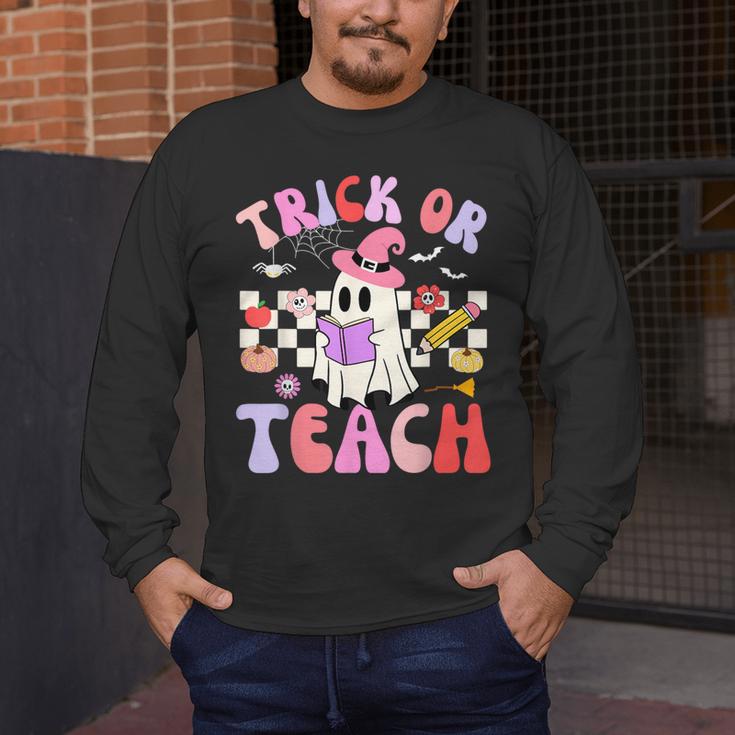 Trick Or Teach Halloween Teacher Floral Ghost Groovy Men's Long Sleeve T-Shirt, funny design
