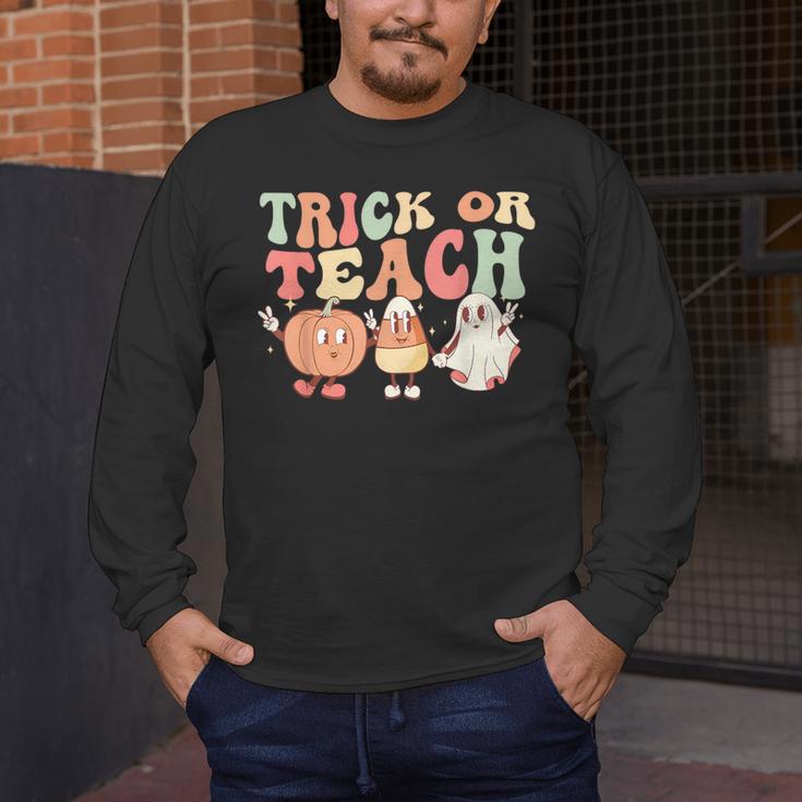 Trick Or Teach Pumpkin Candy Corn Ghost Halloween Teacher Men's Long Sleeve T-Shirt, funny design Trick Or Teach Pumpkin Candy Corn Ghost Halloween Teacher Men's Long Sleeve T-Shirt, funny design