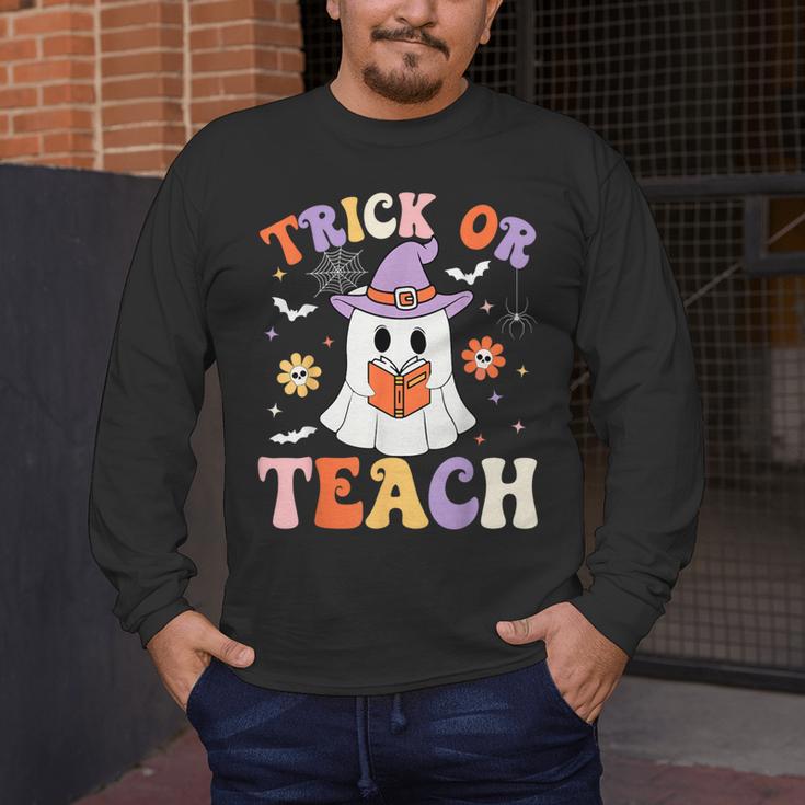 Trick Or Teach Teacher Groovy Ghost Halloween Teacher Men's Long Sleeve T-Shirt, funny design