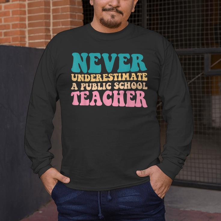 Never Underestimate A Public School Teacher Groovy Women Men's Long Sleeve T-Shirt, funny design Never Underestimate A Public School Teacher Groovy Women Men's Long Sleeve T-Shirt, funny design