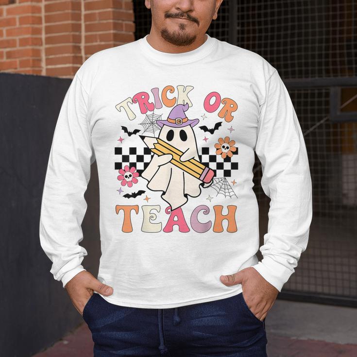Trick Or Teach Groovy Teacher Halloween Retro Floral Ghost Men's Long Sleeve T-Shirt, funny design