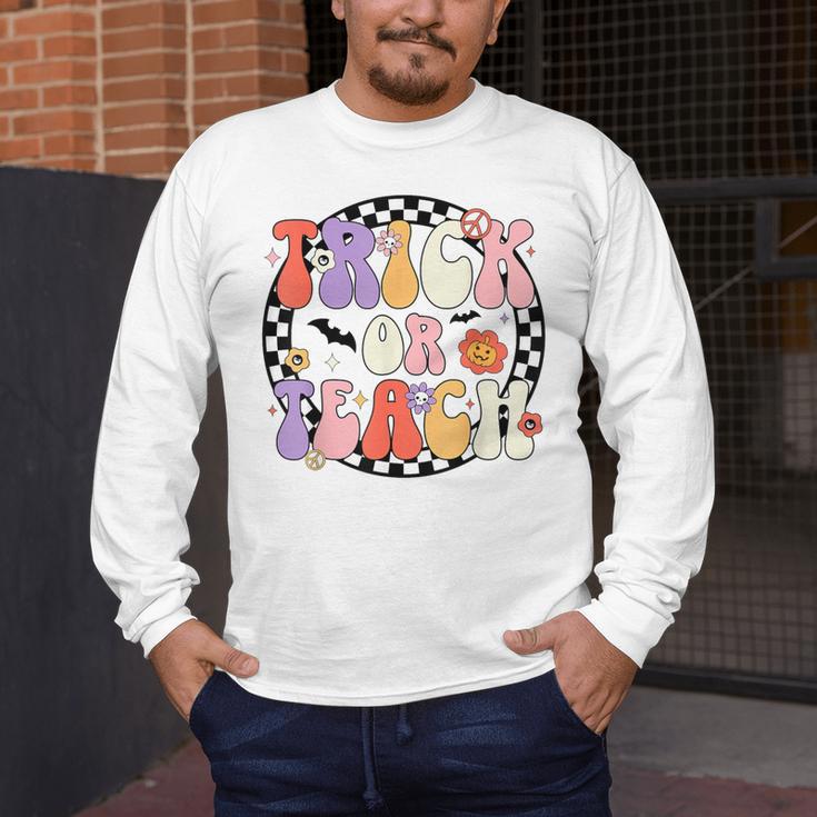 Trick Or Teach Retro Groovy Halloween Teacher Men's Long Sleeve T-Shirt, funny design Trick Or Teach Retro Groovy Halloween Teacher Men's Long Sleeve T-Shirt, funny design