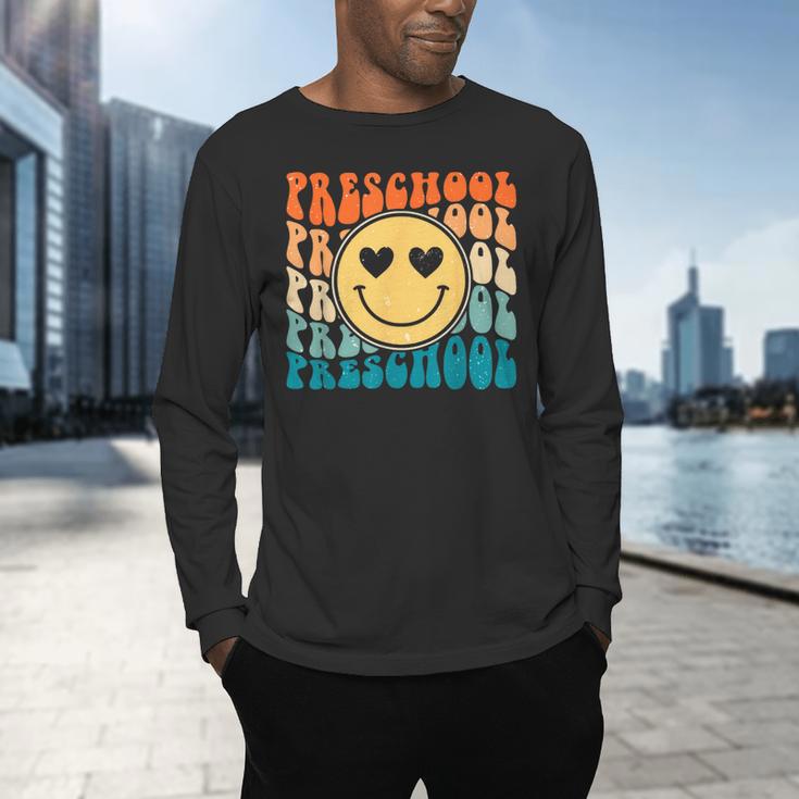 Back To School Groovy Smile Preschool Teachers Students Kids Men's Long Sleeve T-Shirt, gift for family, gift for coworker Back To School Groovy Smile Preschool Teachers Students Kids Men's Long Sleeve T-Shirt, gift for family, gift for coworker