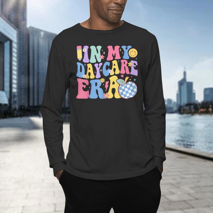 In My Daycare Era Groovy Teacher Daycare First Day Of School Men's Long Sleeve T-Shirt, gift for family, gift for coworker In My Daycare Era Groovy Teacher Daycare First Day Of School Men's Long Sleeve T-Shirt, gift for family, gift for coworker