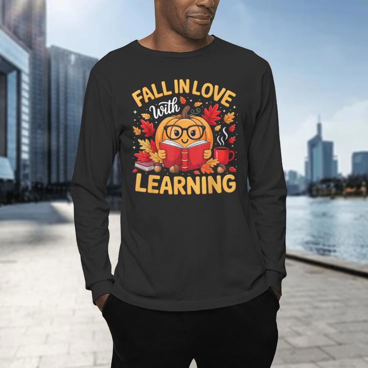 Fall In Love With Learning Pumpkin Thanksgiving Teacher Fall Men's Long Sleeve T-Shirt, gift for family, gift for coworker