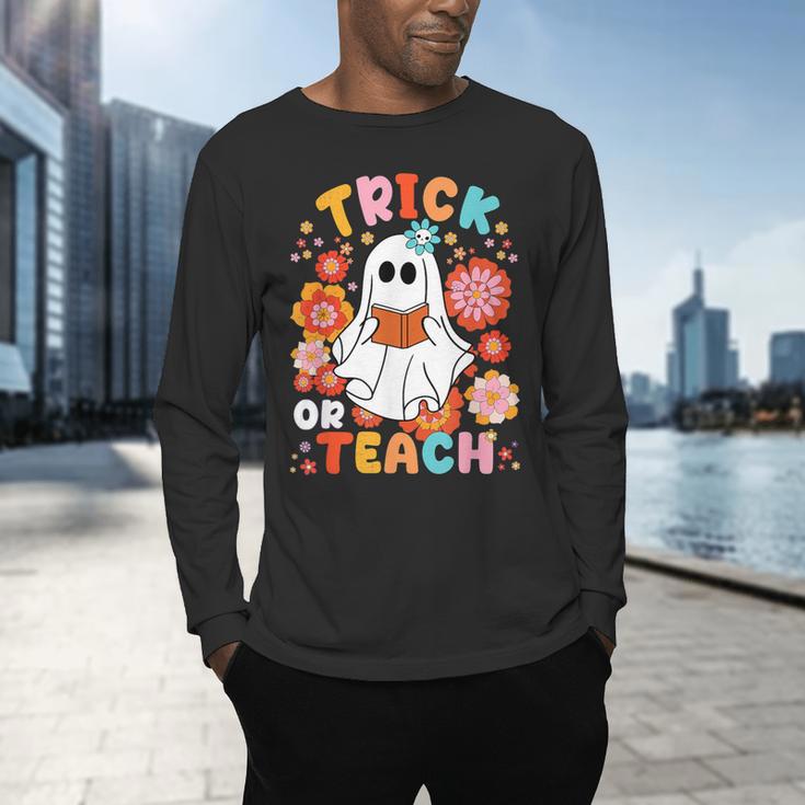 Groovy Halloween Trick Or Teach Retro Floral Ghost Teacher For Men Women Kids Men's Long Sleeve T-Shirt, gift for family, gift for coworker Groovy Halloween Trick Or Teach Retro Floral Ghost Teacher For Men Women Kids Men's Long Sleeve T-Shirt, gift for family, gift for coworker