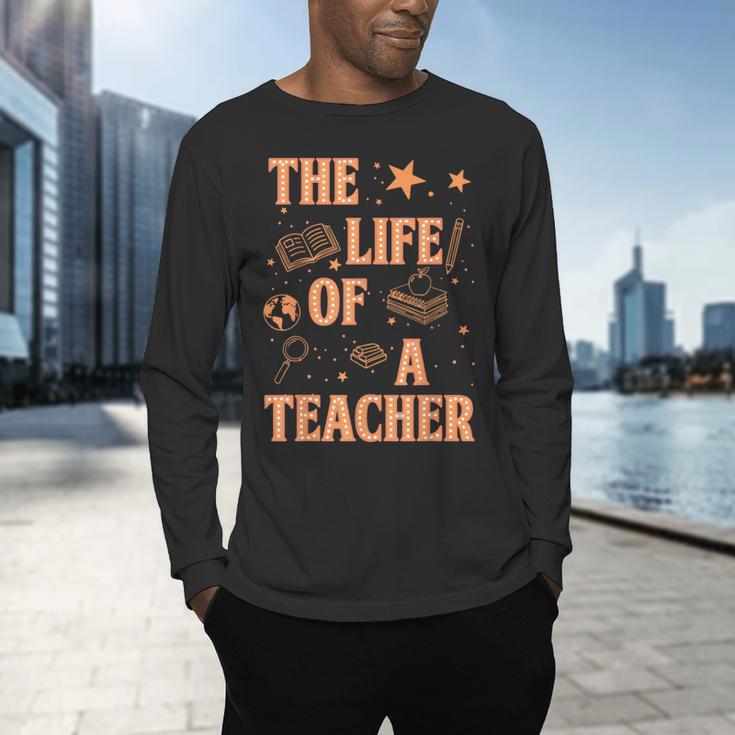 The Life Of A Teacher Back To School Women Men Men's Long Sleeve T-Shirt, gift for family, gift for coworker The Life Of A Teacher Back To School Women Men Men's Long Sleeve T-Shirt, gift for family, gift for coworker