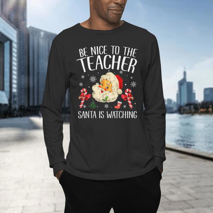 Be Nice To The Teacher Santa Is Watching School Christmas Men's Long Sleeve T-Shirt, gift for family, gift for coworker Be Nice To The Teacher Santa Is Watching School Christmas Men's Long Sleeve T-Shirt, gift for family, gift for coworker