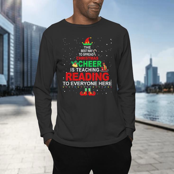 Reading Teacher Christmas Shirt Elf Christmas Cheer For Men Women Men's Long Sleeve T-Shirt, gift for family, gift for coworker Reading Teacher Christmas Shirt Elf Christmas Cheer For Men Women Men's Long Sleeve T-Shirt, gift for family, gift for coworker