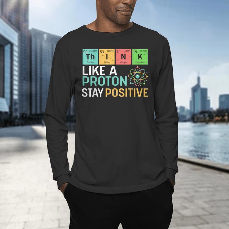 Think Like A Proton Stay Positive Science Teacher Men's Long Sleeve T-Shirt, gift for family, gift for coworker Think Like A Proton Stay Positive Science Teacher Men's Long Sleeve T-Shirt, gift for family, gift for coworker