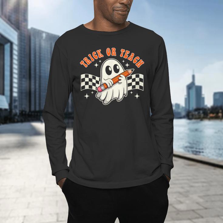 Trick Or Teach Groovy Retro Ghost Halloween Teacher Kids Men's Long Sleeve T-Shirt, gift for family, gift for coworker