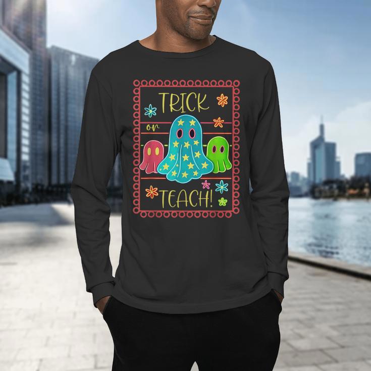 Trick Or Teach Neon Ghost Flower Teacher Spooky Halloween Men's Long Sleeve T-Shirt, gift for family, gift for coworker