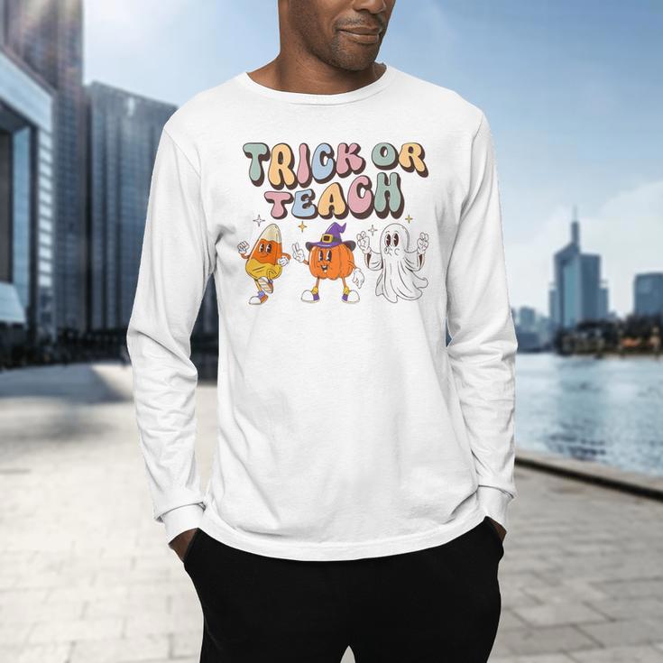 Trick Or Teach Candy Corn Pumpkin Ghost Teacher Men's Long Sleeve T-Shirt, gift for family, gift for coworker Trick Or Teach Candy Corn Pumpkin Ghost Teacher Men's Long Sleeve T-Shirt, gift for family, gift for coworker